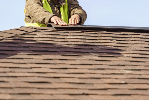 Inspect Shingles-Clarksville Roofing